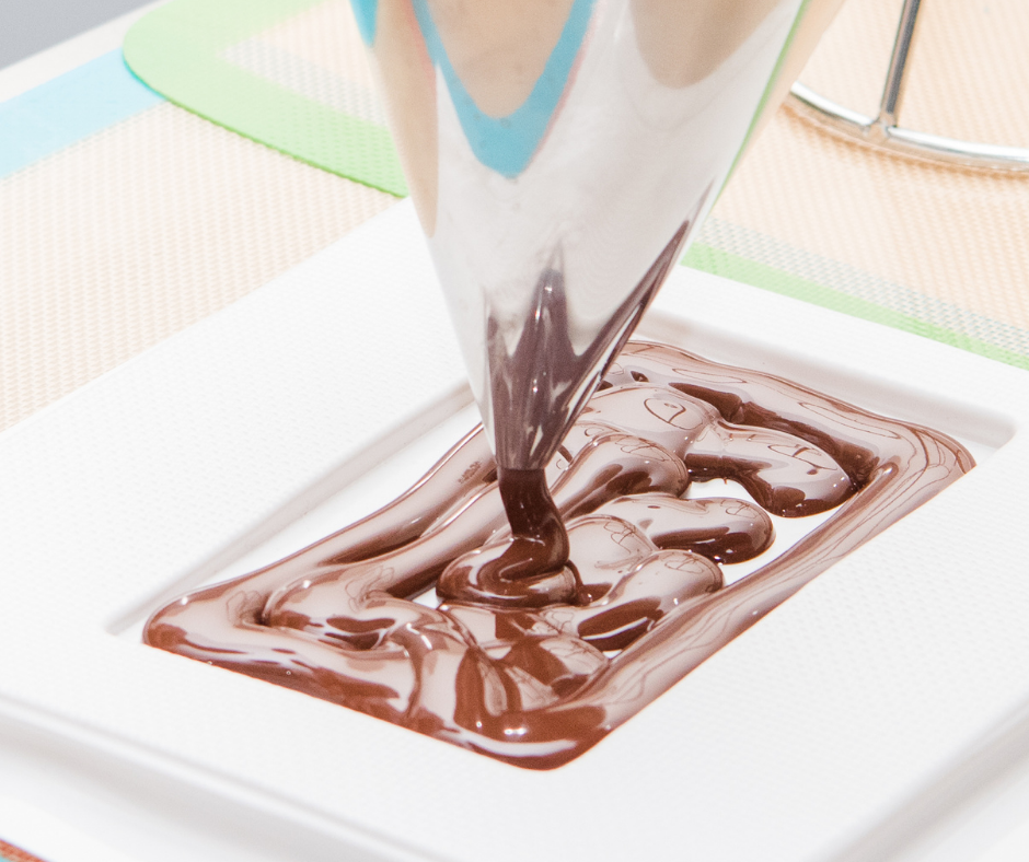 11-pouring-melted-chocolate-into-a-mould