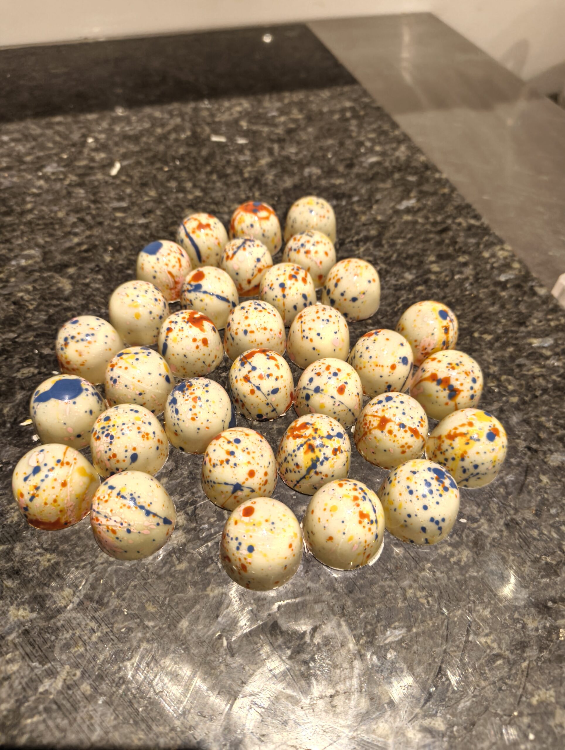 A selection of white chocolate birthday cake truffles