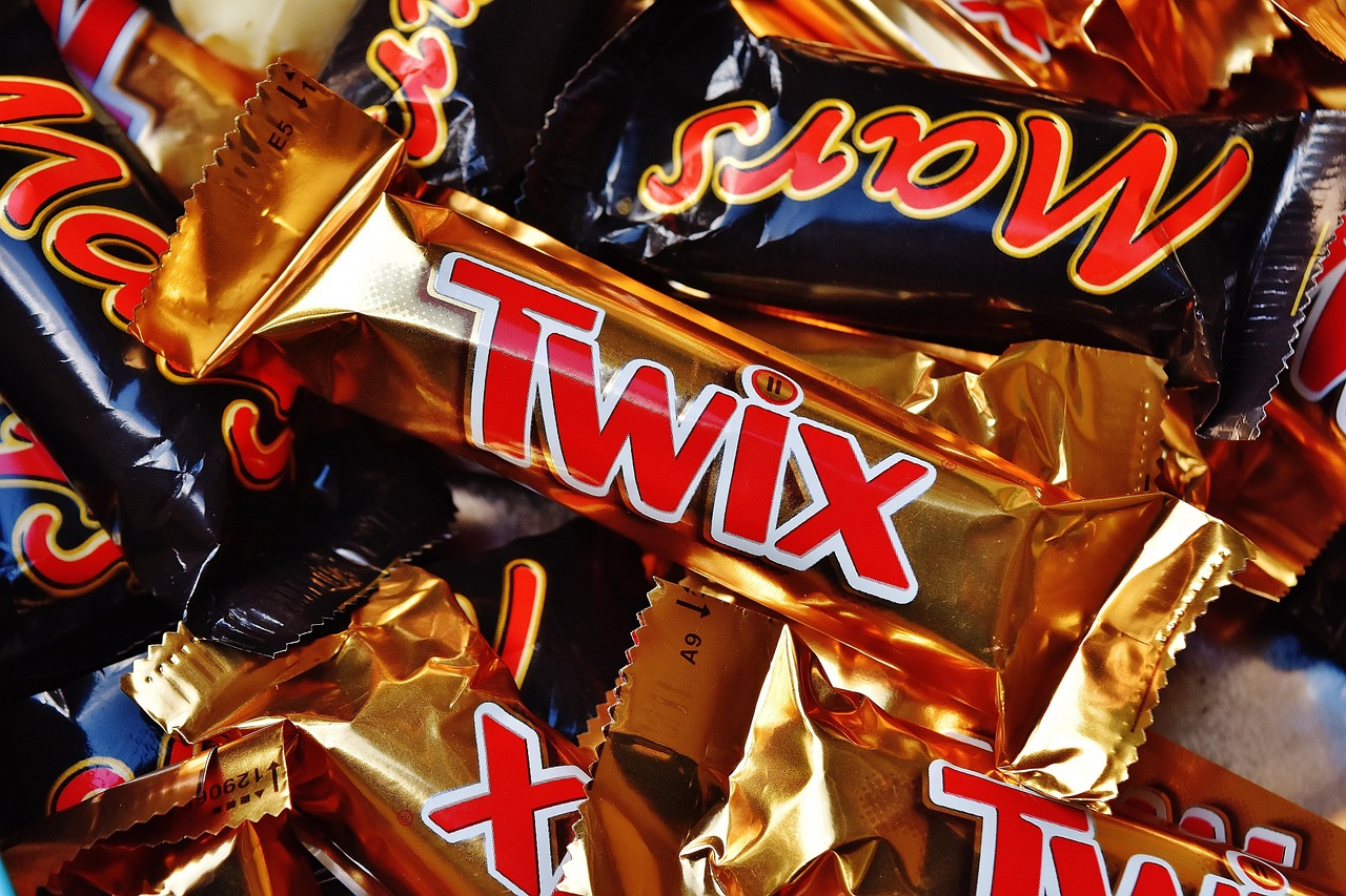 A pile of mars and twix chocolate bars